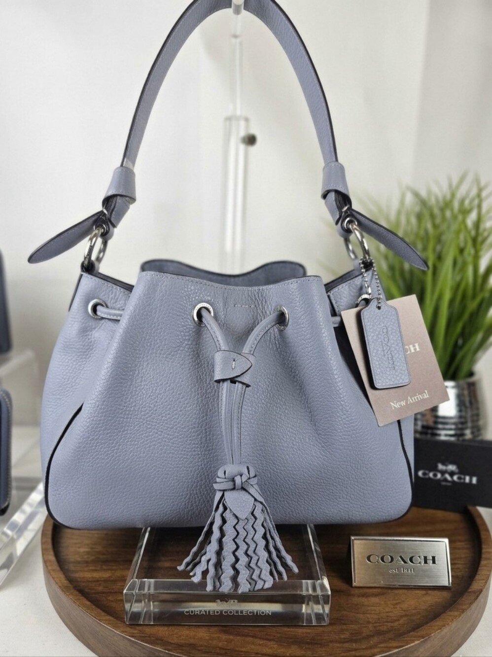Coach Everly Pebbled Leather Drawstring Shoulder Bucket Hand Bag in Dusty Blue